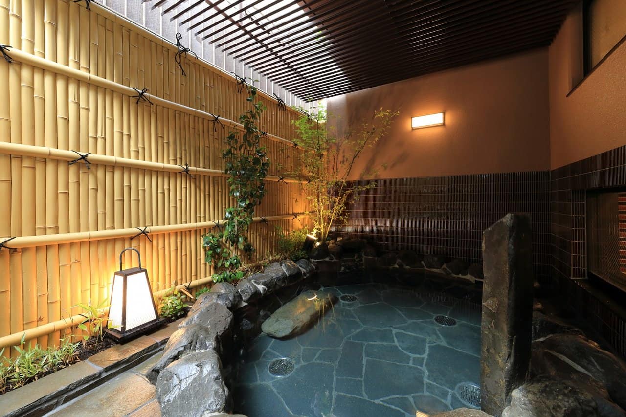 On site at the hotel natural spring water bath at our yoga and culture retreat in Kyoto, Japan March 27 to April 1, 2024 for cherry blossom season.